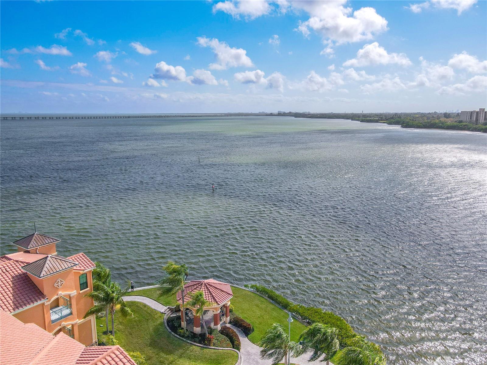 An aerial perspective showcases the prime waterfront setting of The Grand Bellagio at Baywatch, nestled along Old Tampa Bay.