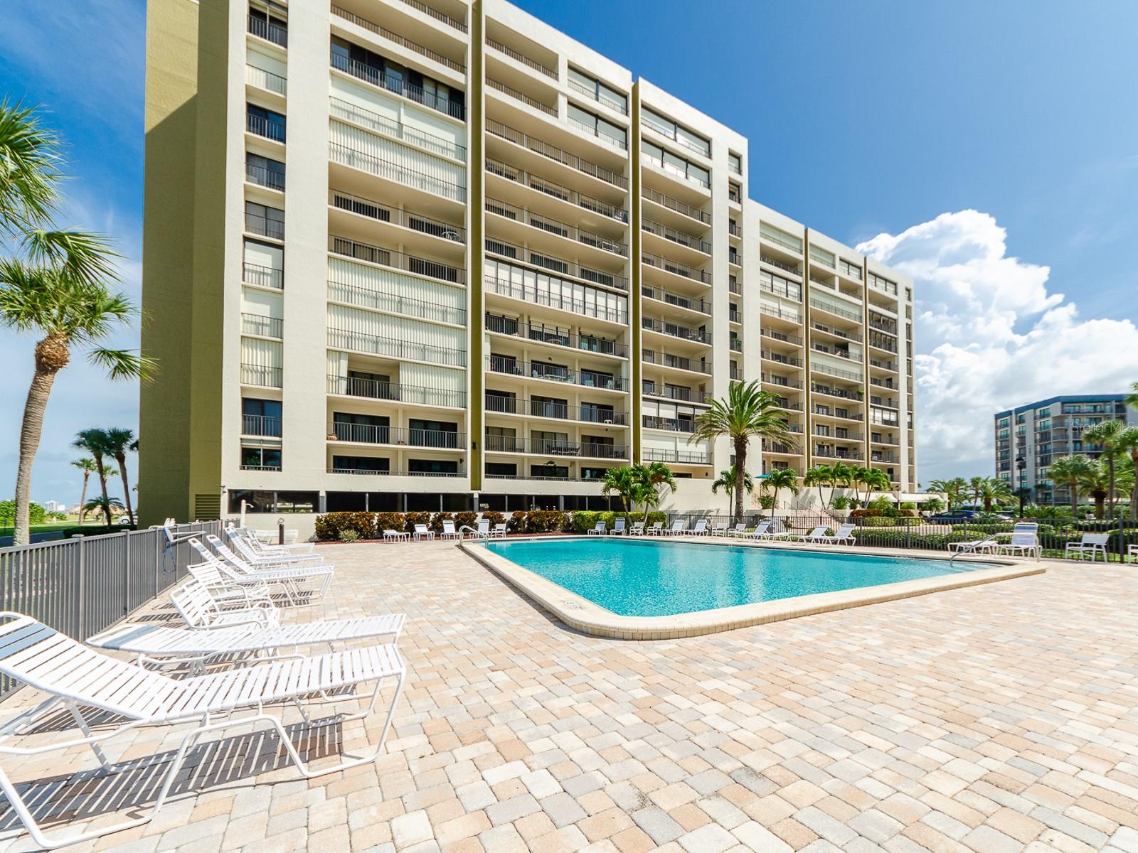 RELAX BY THE LARGE POOL, OVERLOOKING THE GULF