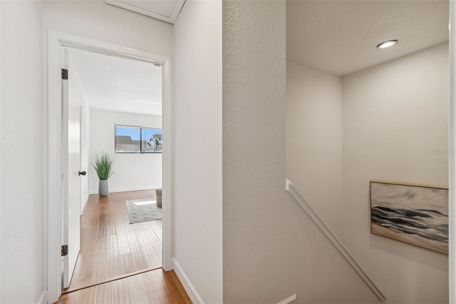 Upstairs there are two bedrooms, each with an attached bathroom.