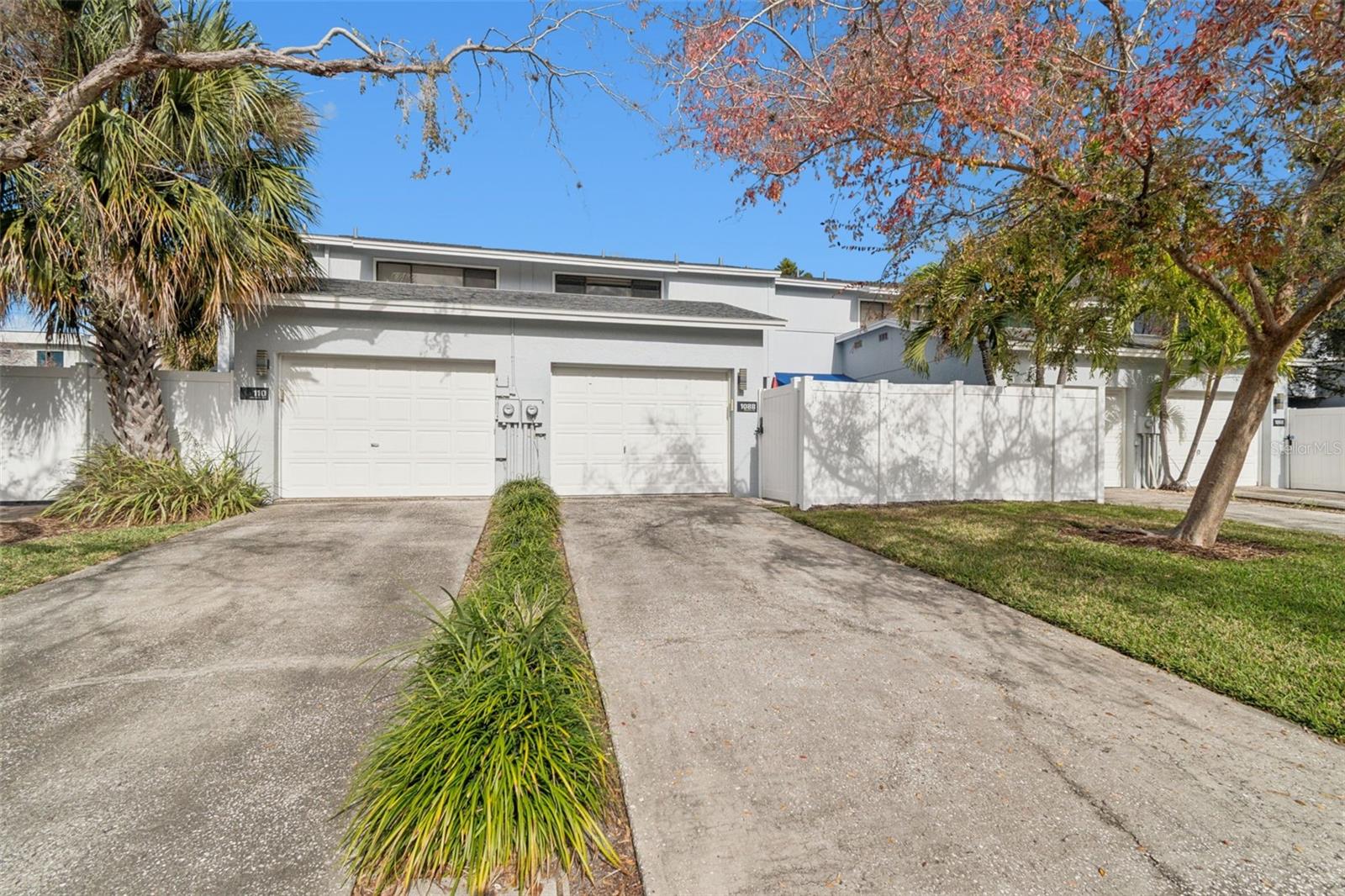 Driveway and two car garage.