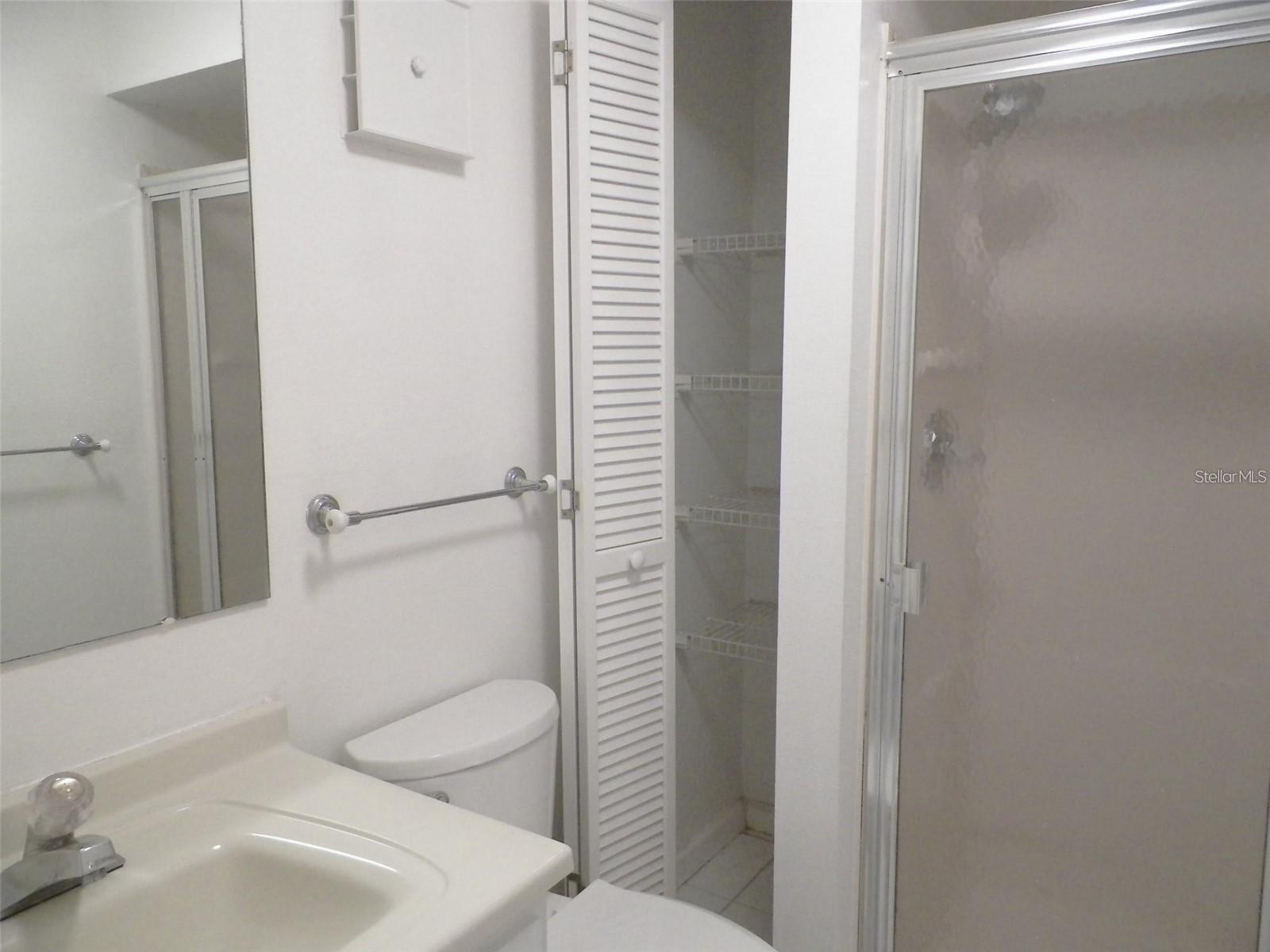 Primary bathroom with linen closet