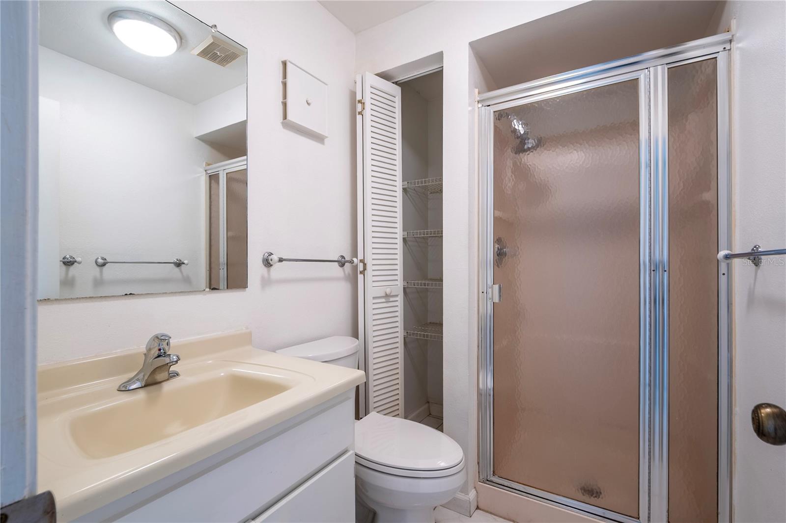 Primary bathroom with linen closet