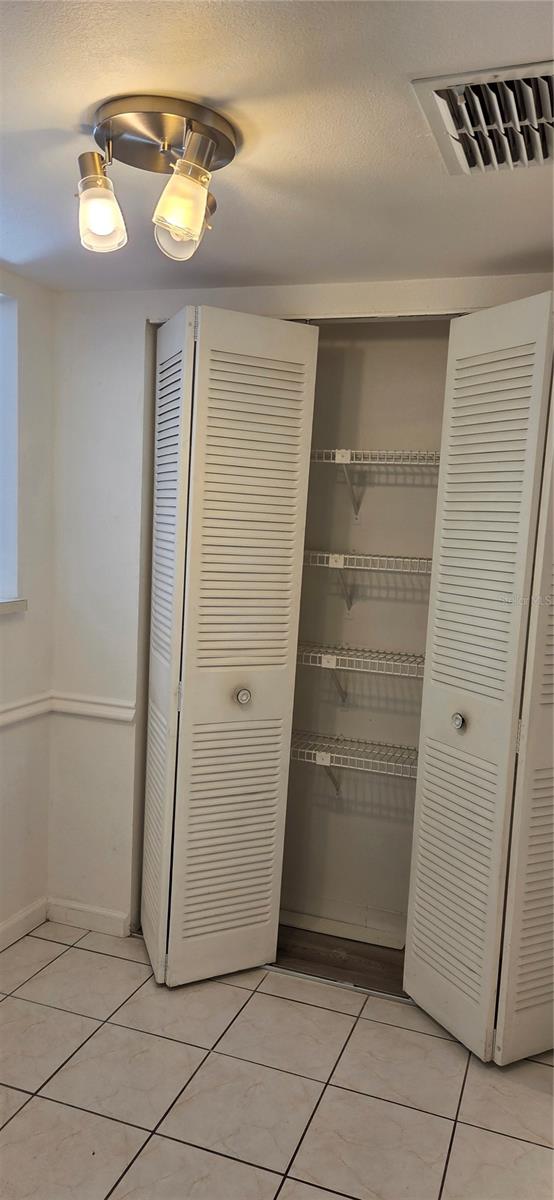 Double pantry closet in kitchen