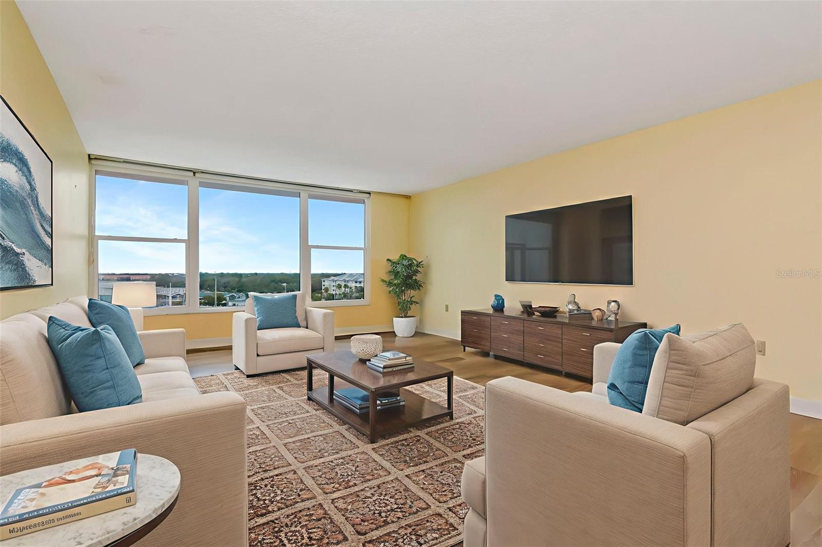 Virtually-staged-Living room overlooking the marina