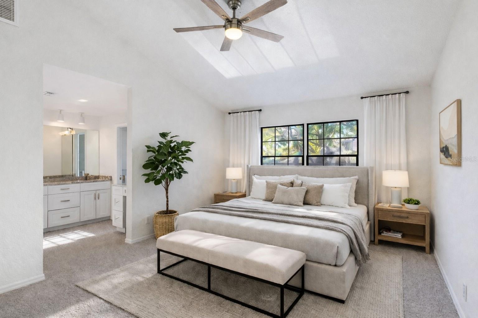 AI photo.  Primary Suite.  A large room with plenty of natural light and a newly renovated ensuite bath