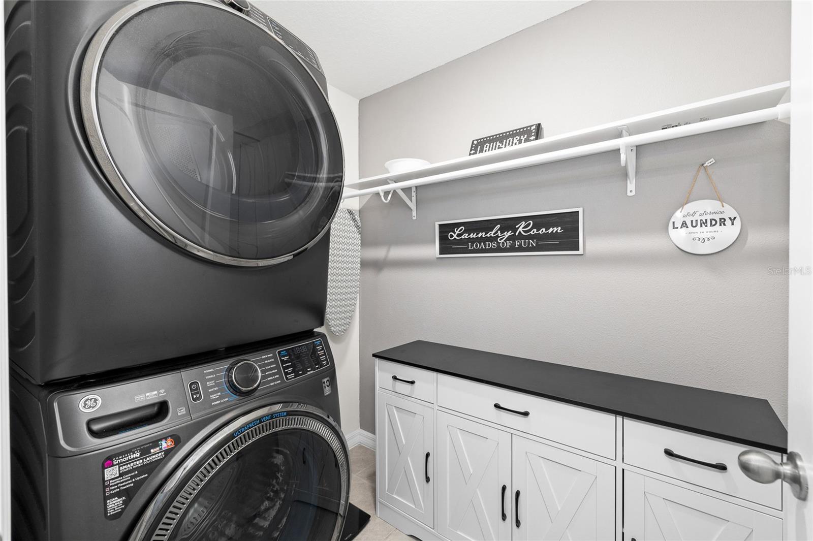 Laundry Room- washer and dryer convey