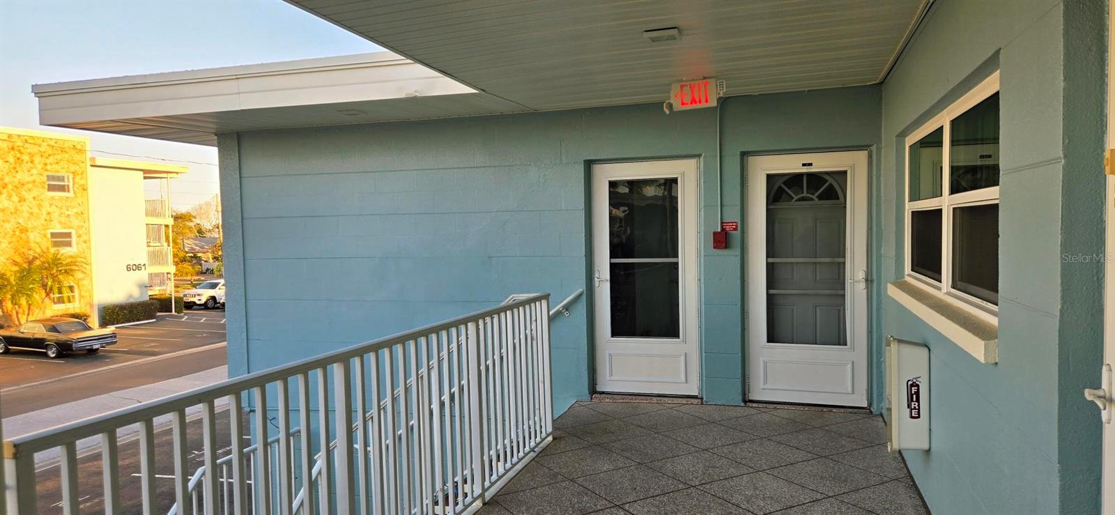 Front door on right & private door to primary bedroom.