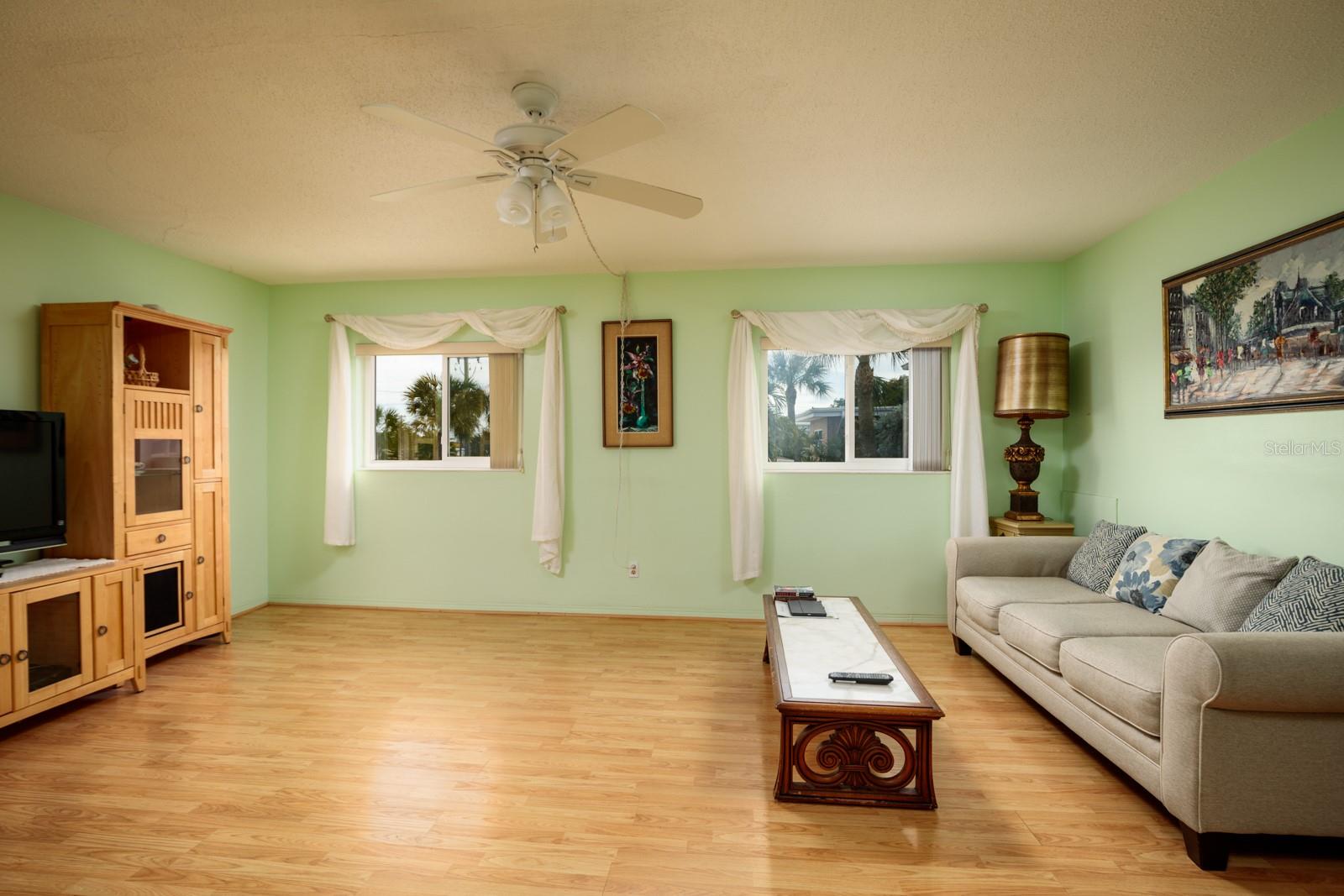 Hurricane Impact windows in Living room only & face south.
