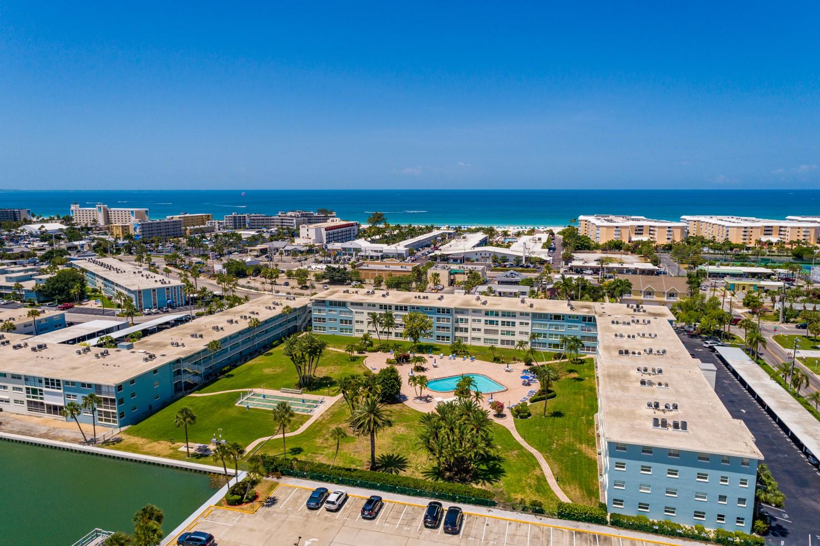 North pool (heated), courtyard & grilling area.
