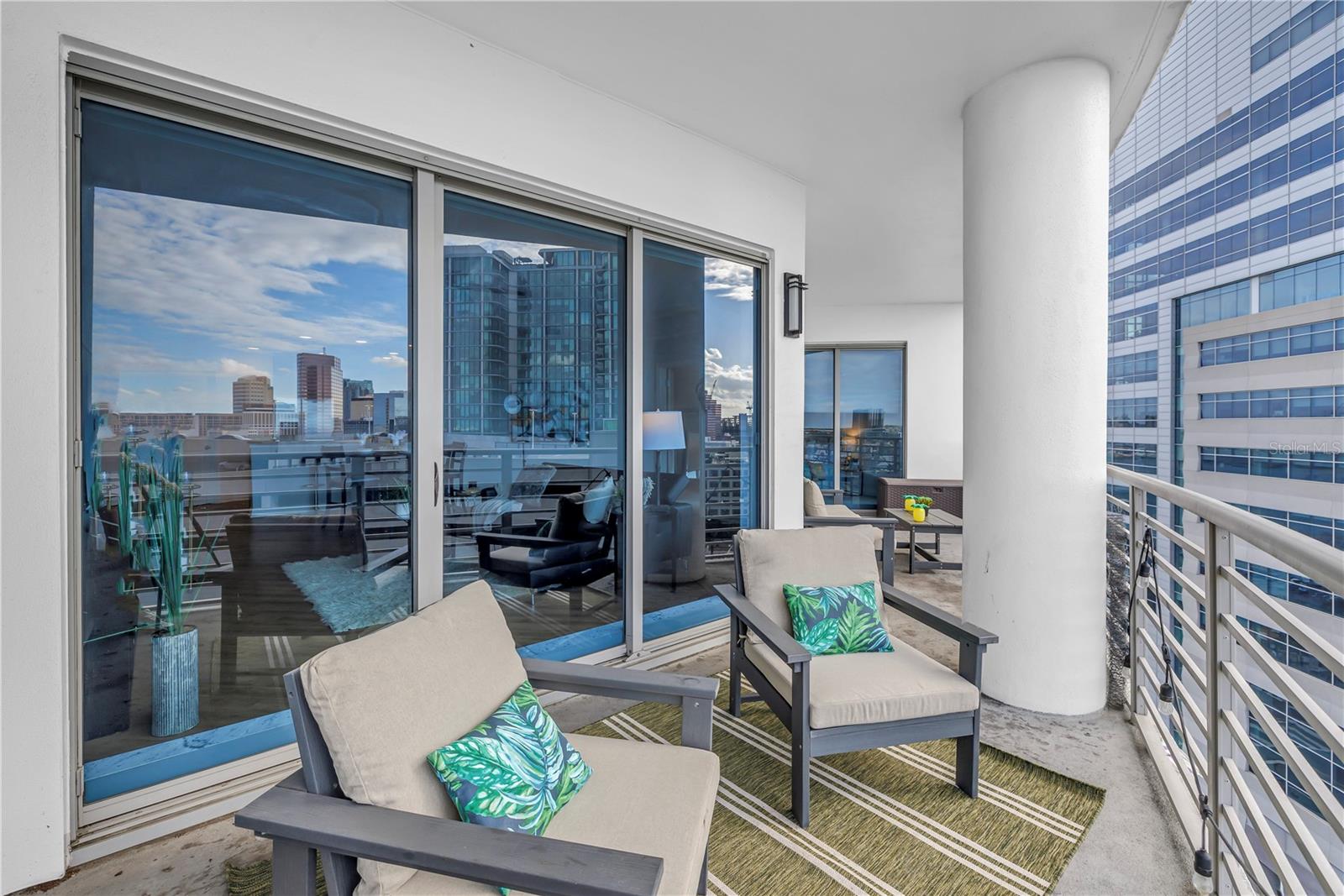 Enjoy the Outdoor Views and Sounds of the Vibrant City from 12 Floors Up.  COOL!