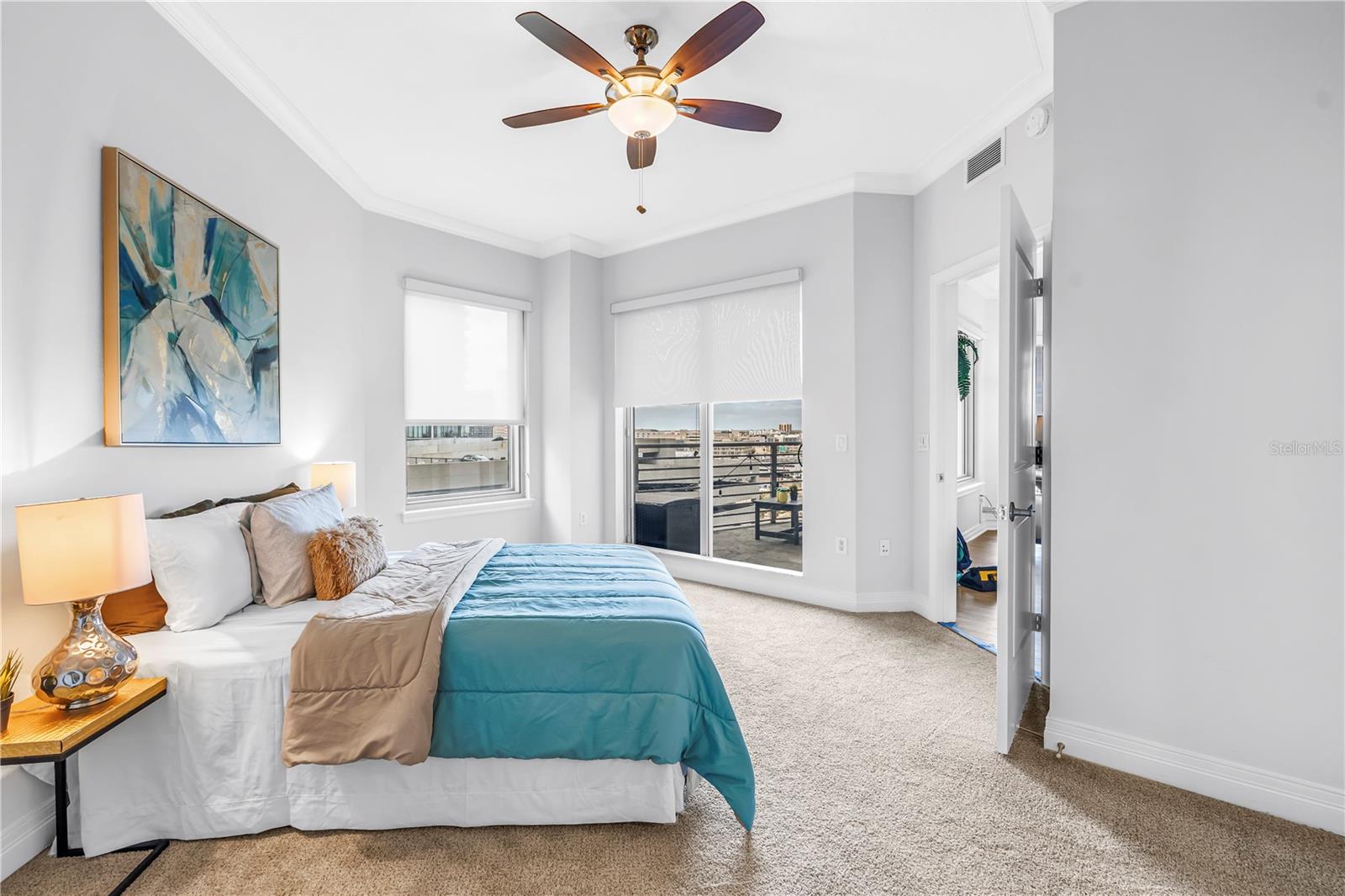 Left Primary Spacious with Sliders to the Deck Vista.  Great Light and equal en Suite Luxury