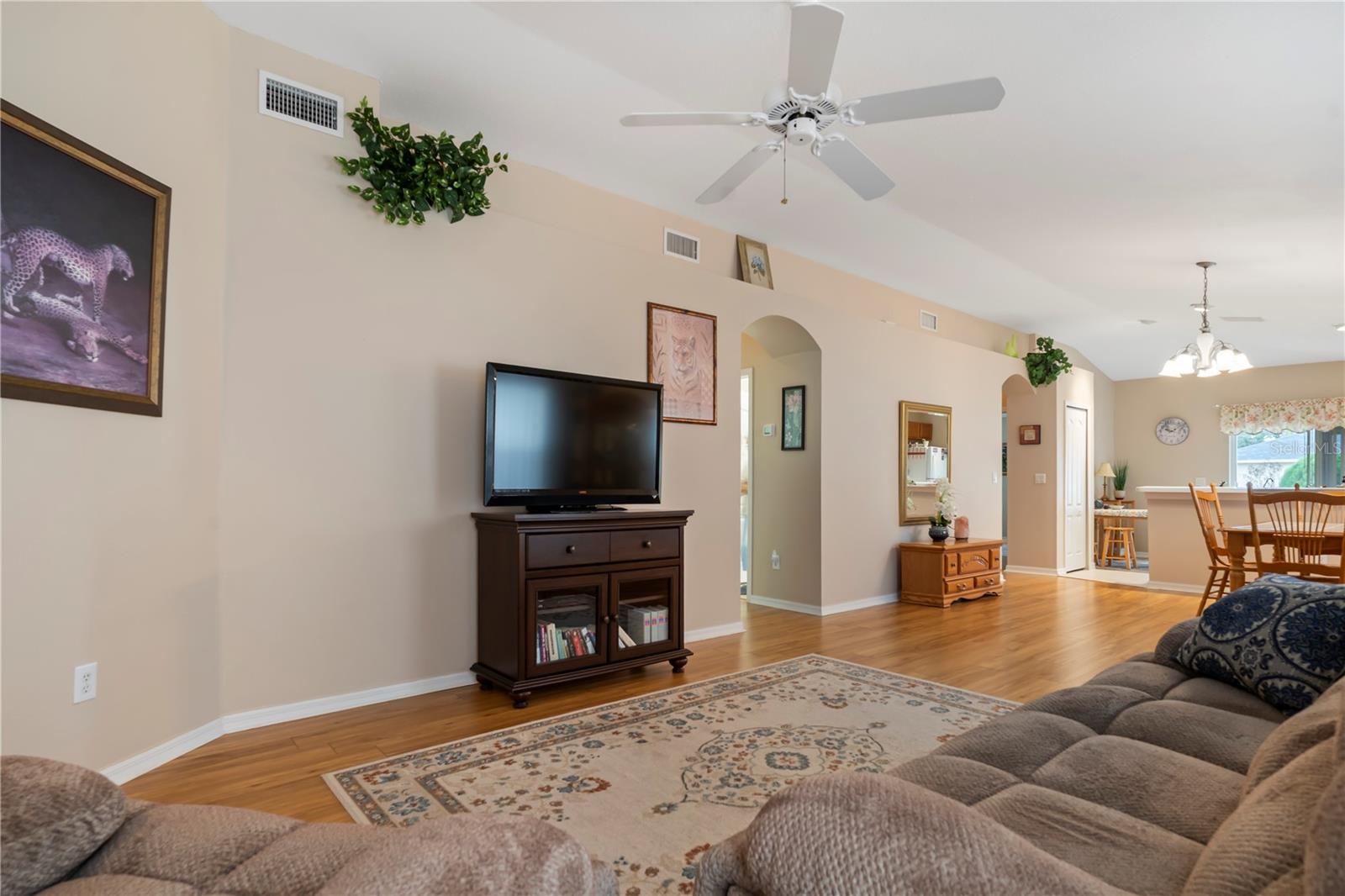 Bright and open living space filled with natural light, featuring a functional layout ideal for everyday living and entertaining.