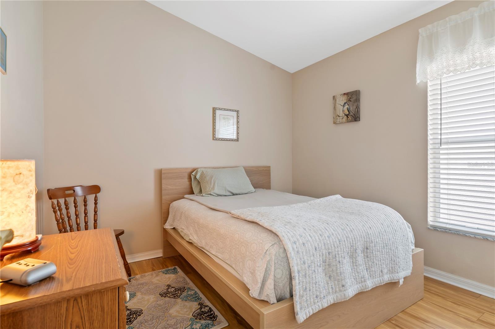 Secondary BedroomSpacious secondary bedroom ideal for family, guests, or a home office setup.