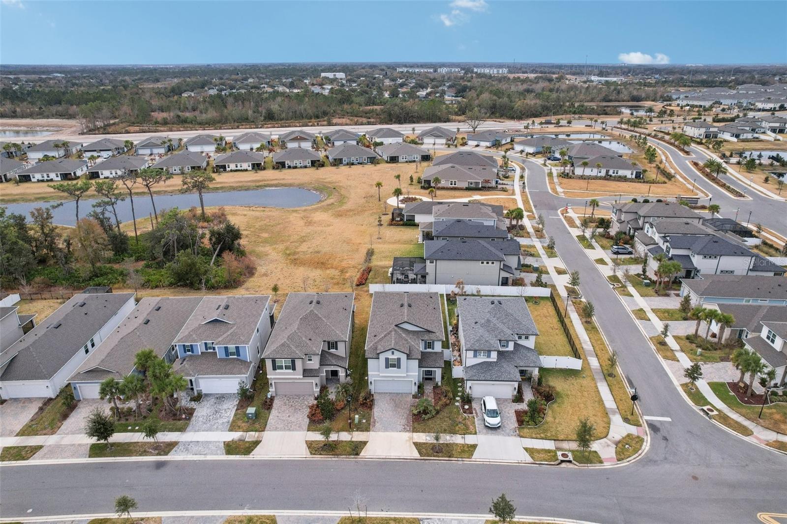 Notice the open green space behind the house!