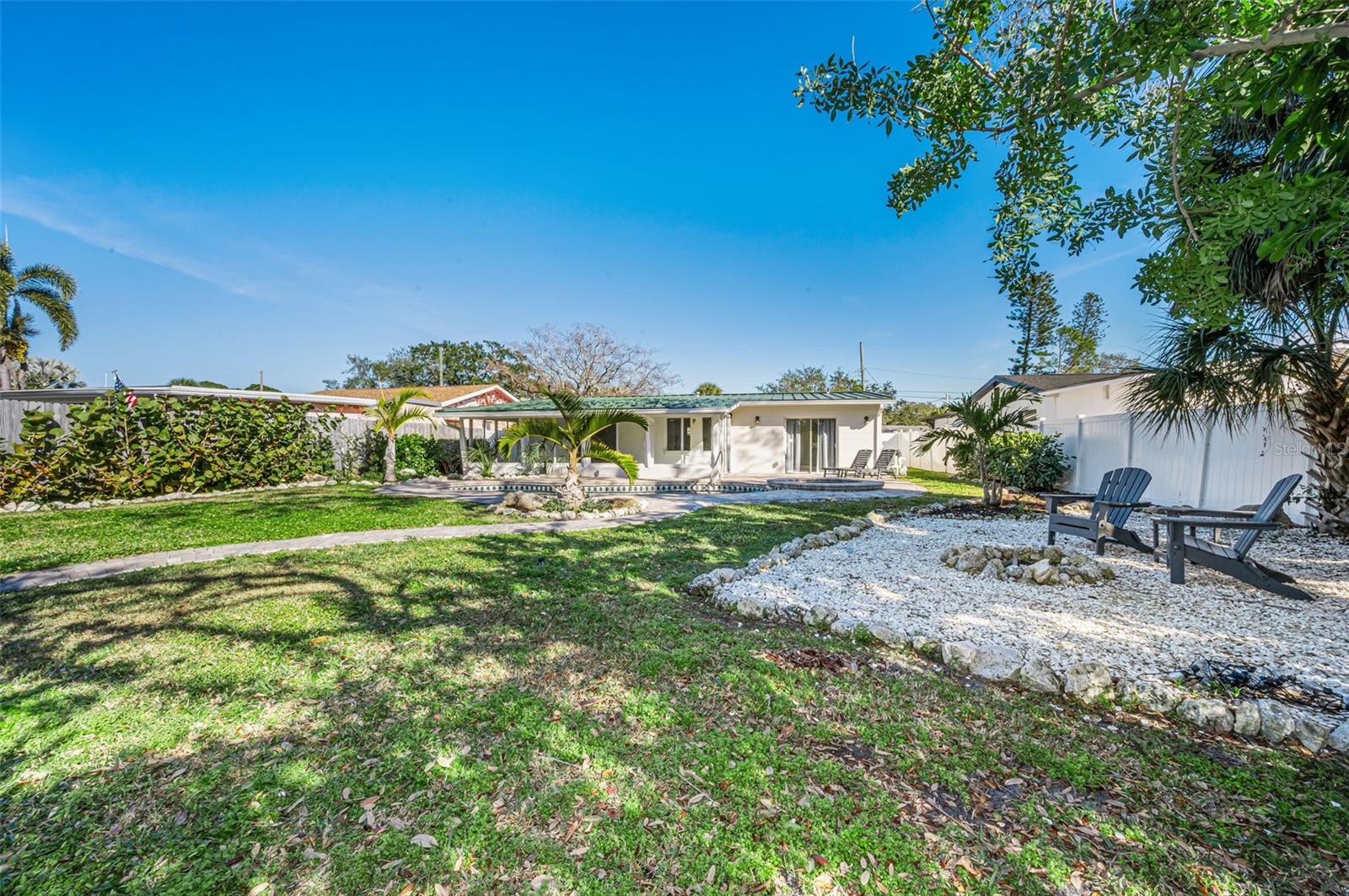 Backyard looking at exterior back of house