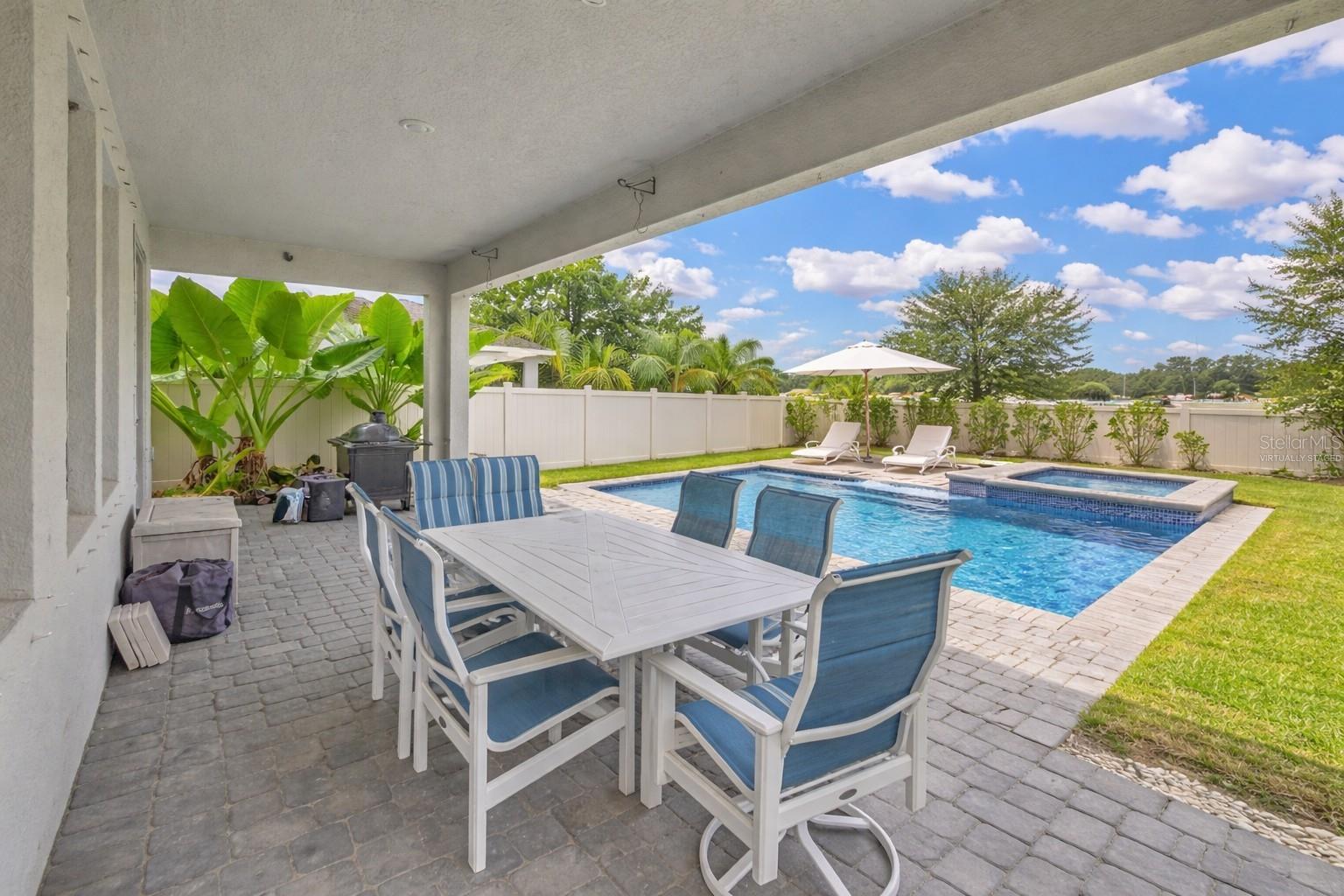 VIRTUALLY STAGED POOL PHOTO. POOL IS NOT IN BACKYARD.