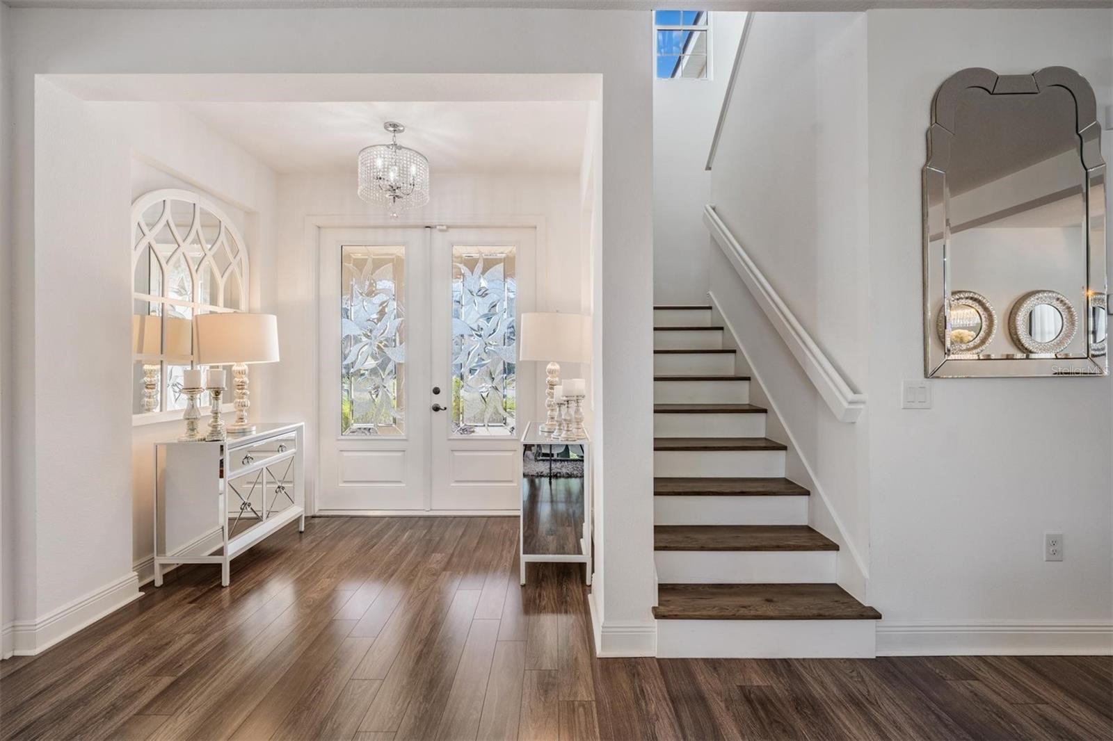 Lots of natural light from double front doors!