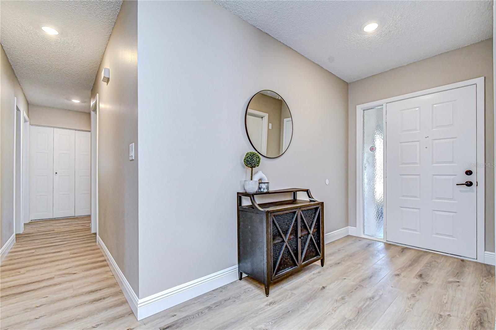 Front Door, Foyer, to Hallway to Bedrooms