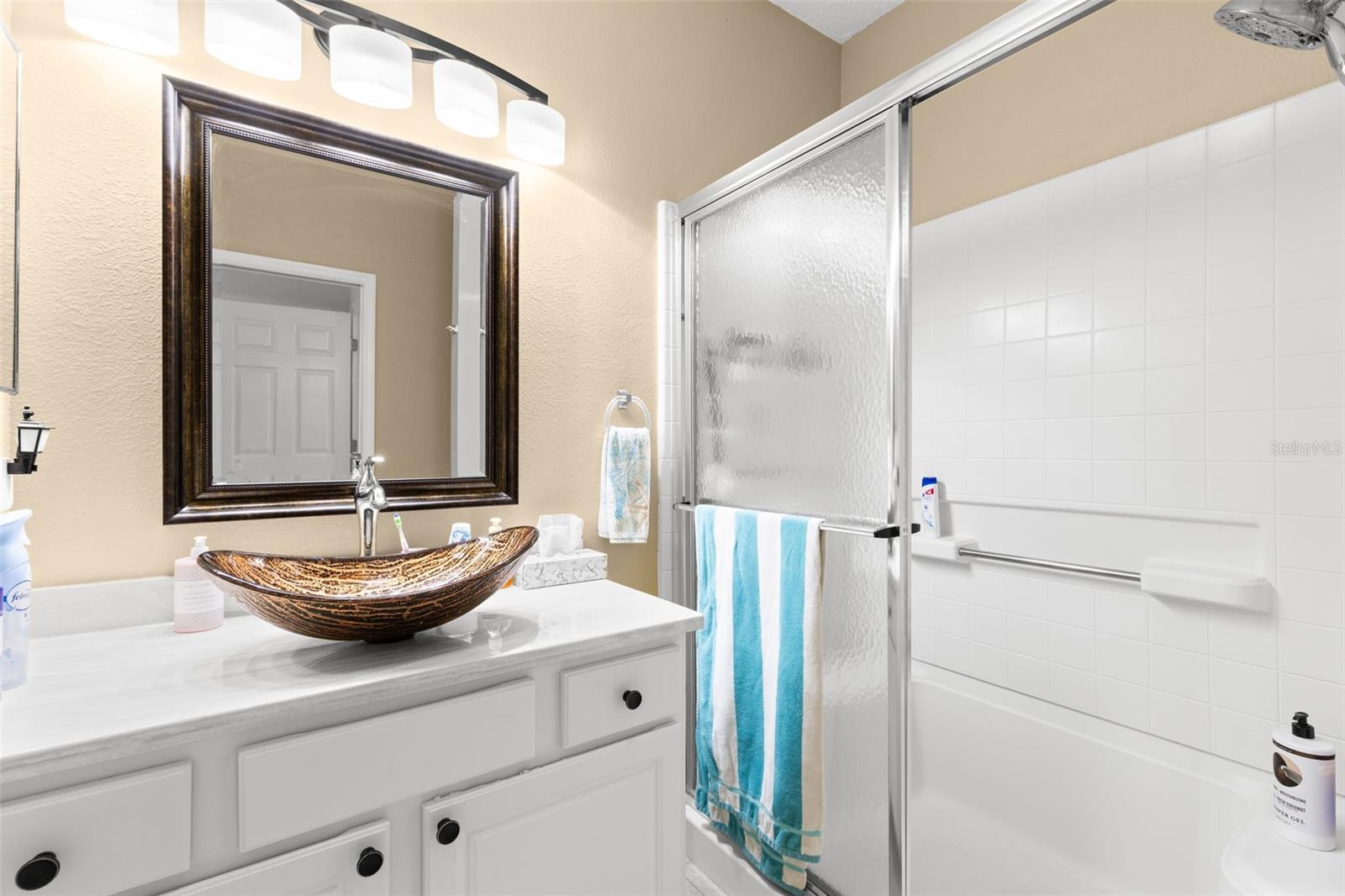 Primary bathroom with step-in shower