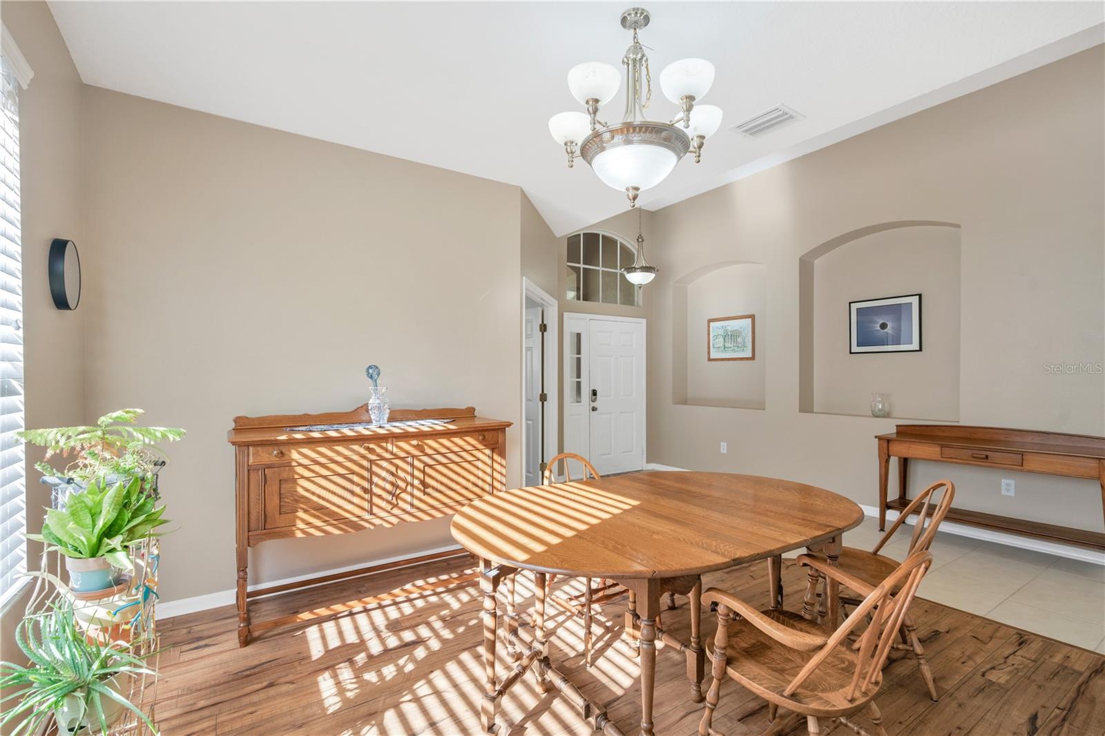 The natural light and the architectural niches add to the warth and charm of this home.