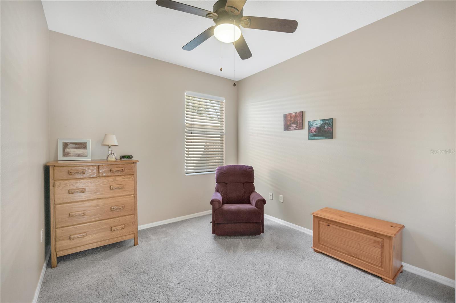 Secondary bedrooms are generously sized and 2 have carpet, ceiling fans and built in closets.