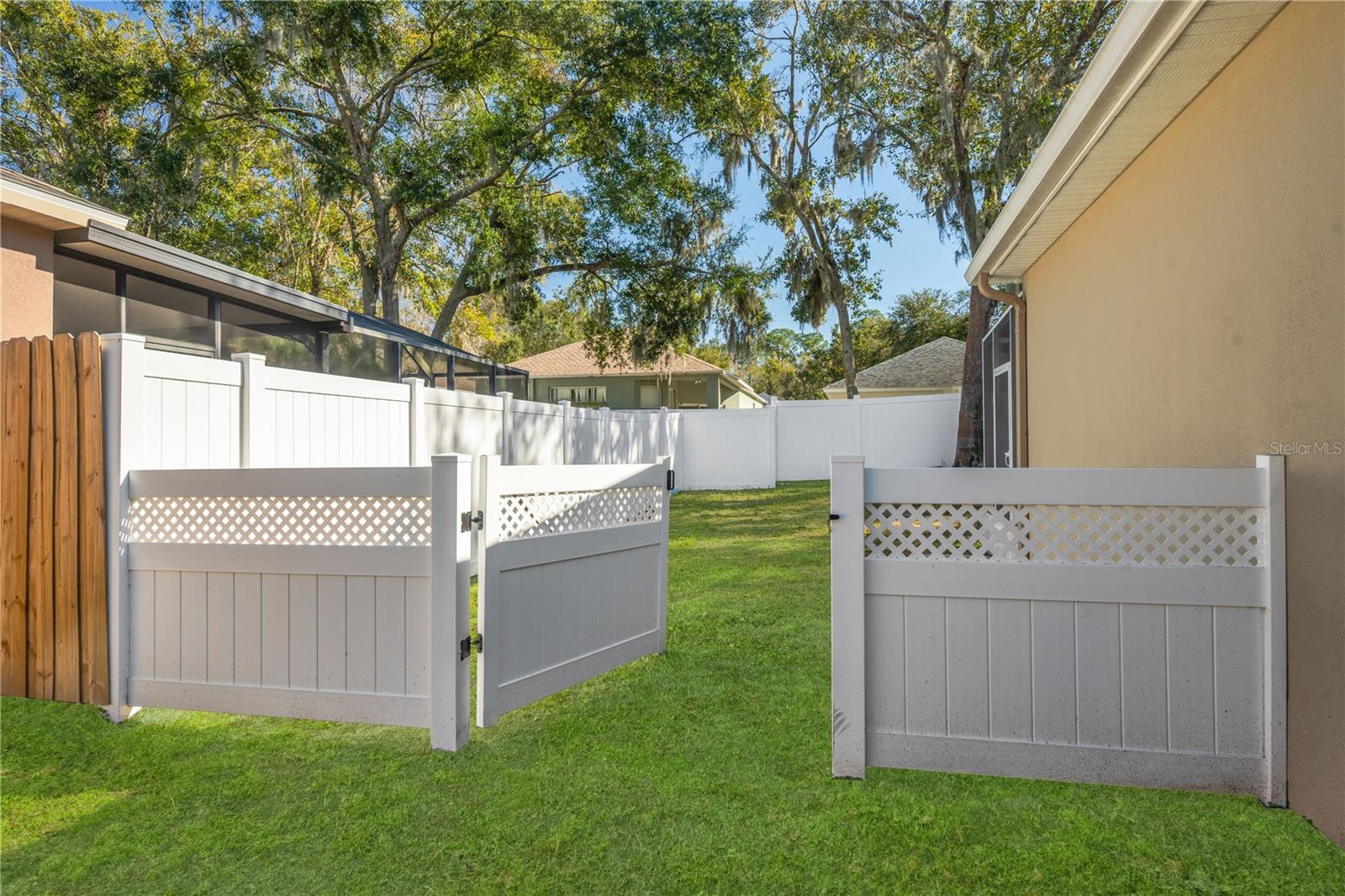 Access gate from front yard to back yard.