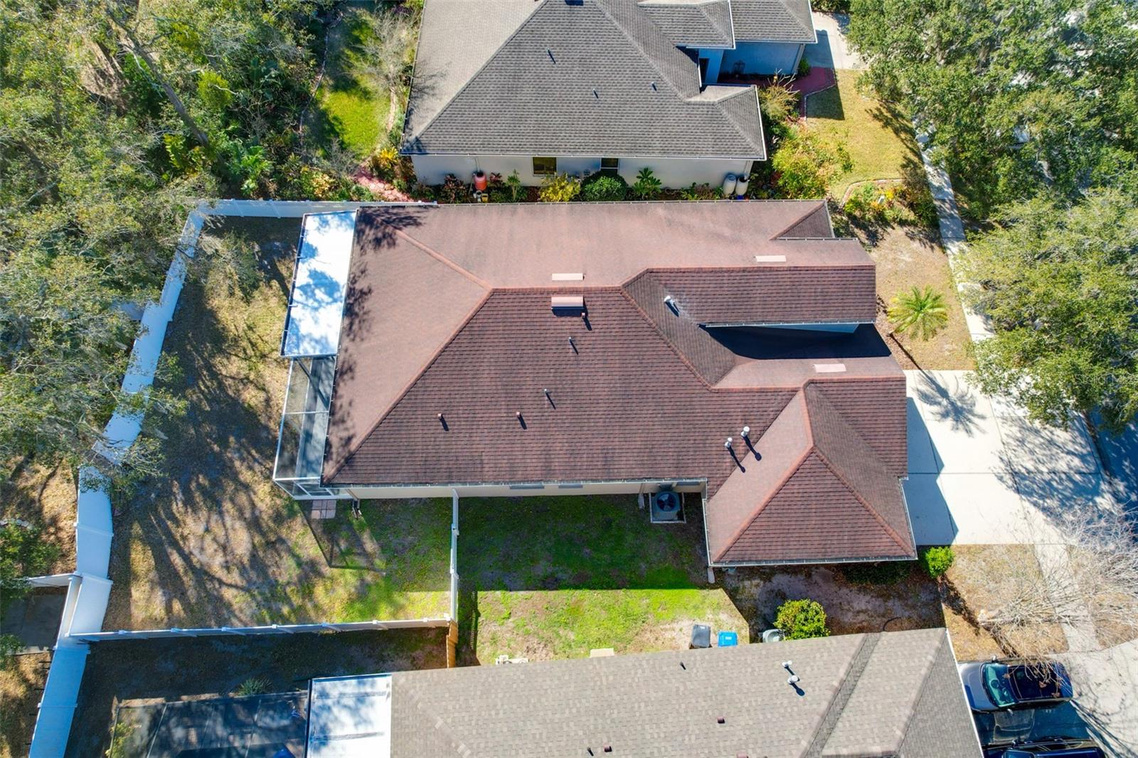 Aerial view of the lot, highlighting its setting within FishHawk Ranch, where residents enjoy a low HOA and exceptional amenities including a clubhouse, resort-style pool, playgrounds, scenic nature trails, tennis courts, soccer field, and basketball court.