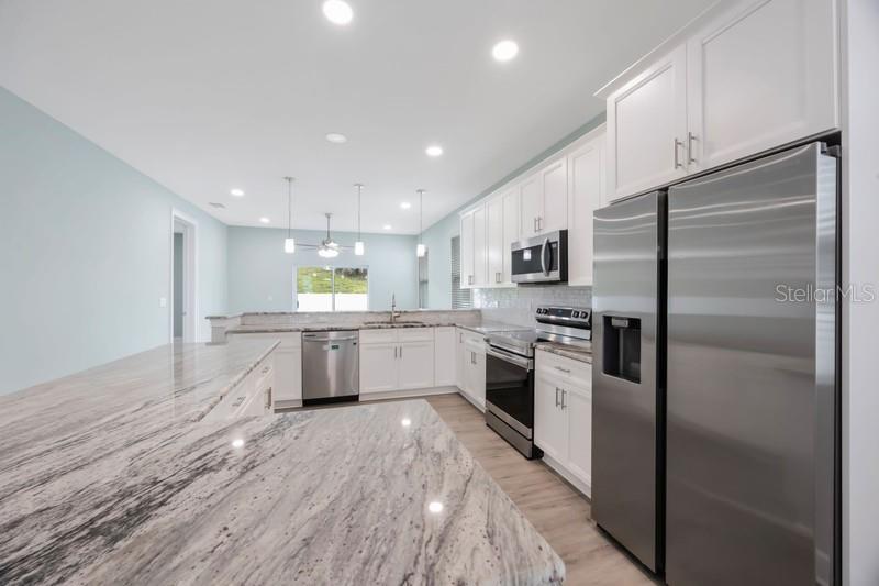 Kitchen: Plenty of countertops & cabinets