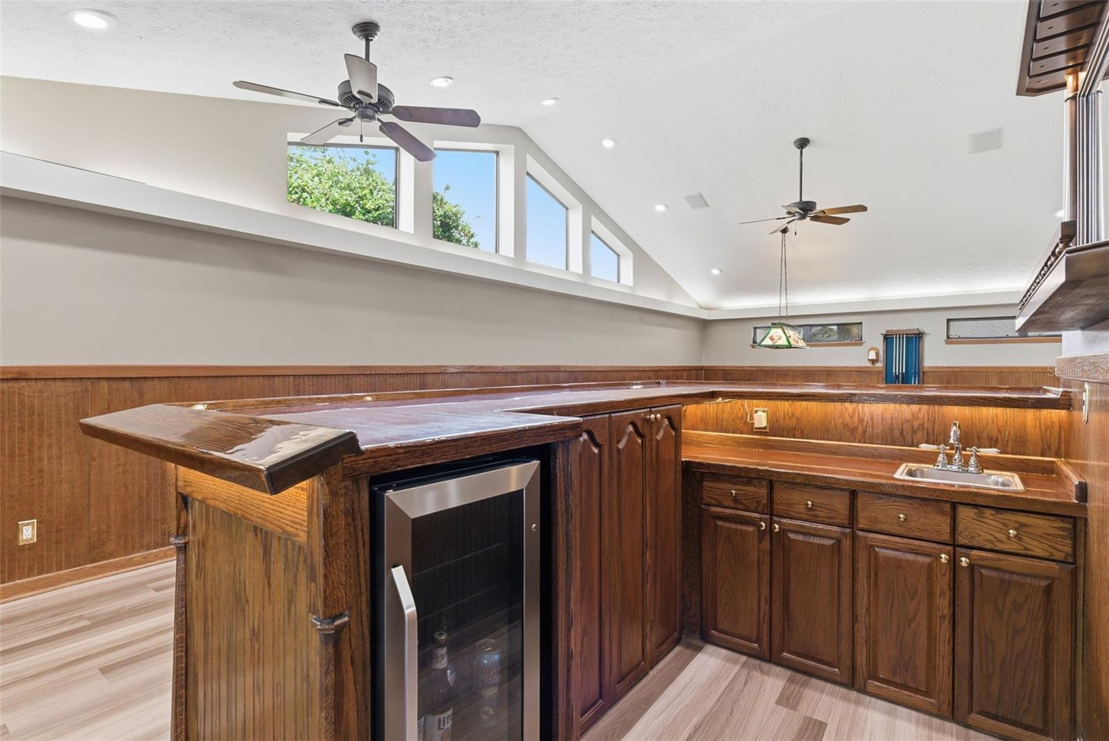 Custom Bar with sink, beverage refrigerator