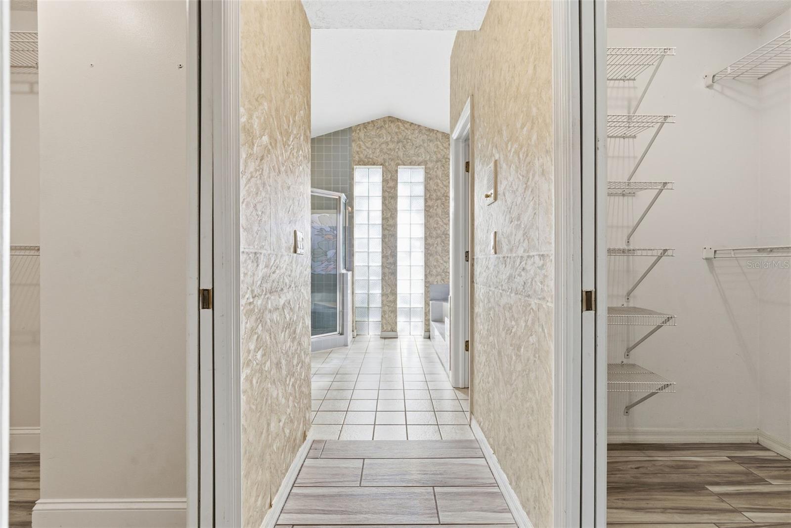 Primary bedroom to ensuite bath