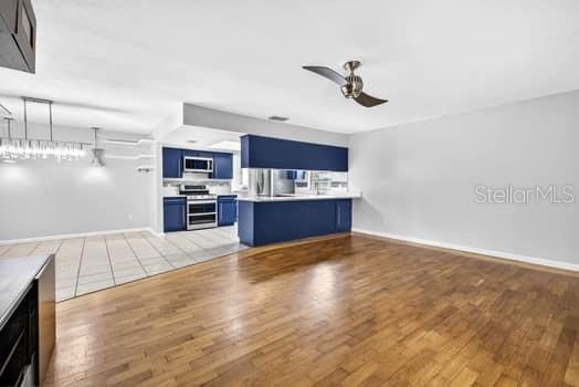 View of dining room and kitchen from living room