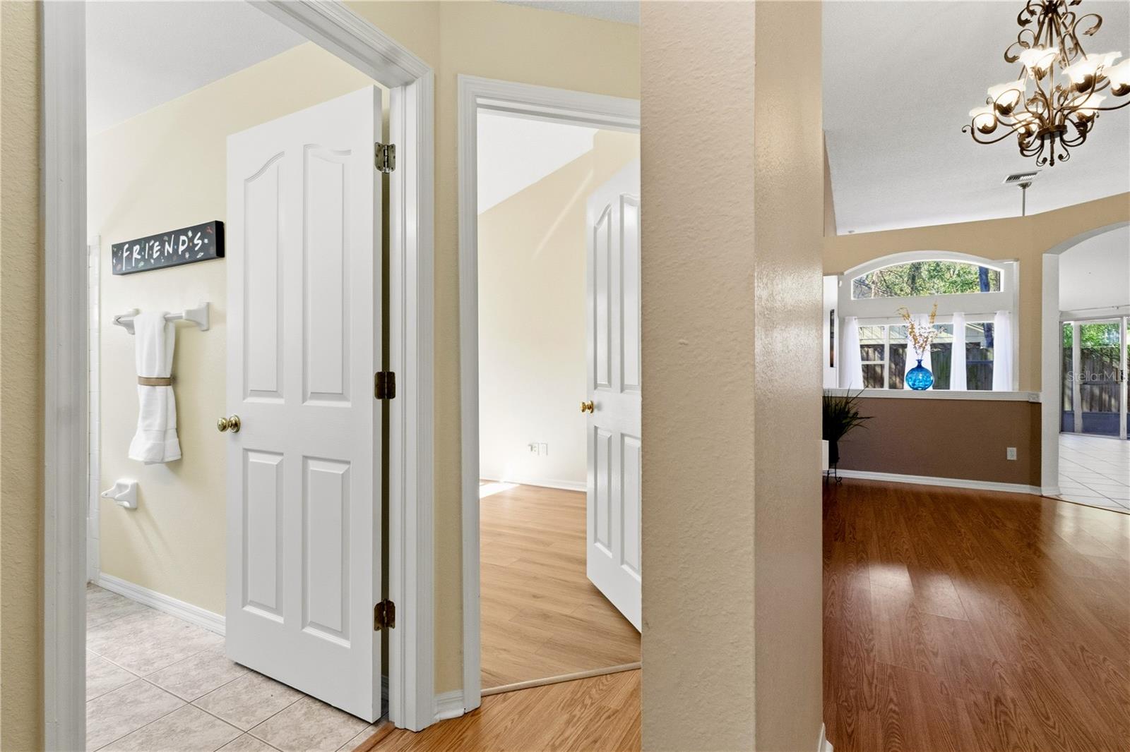 All of the secondary bedrooms and bathroom are off the dining room