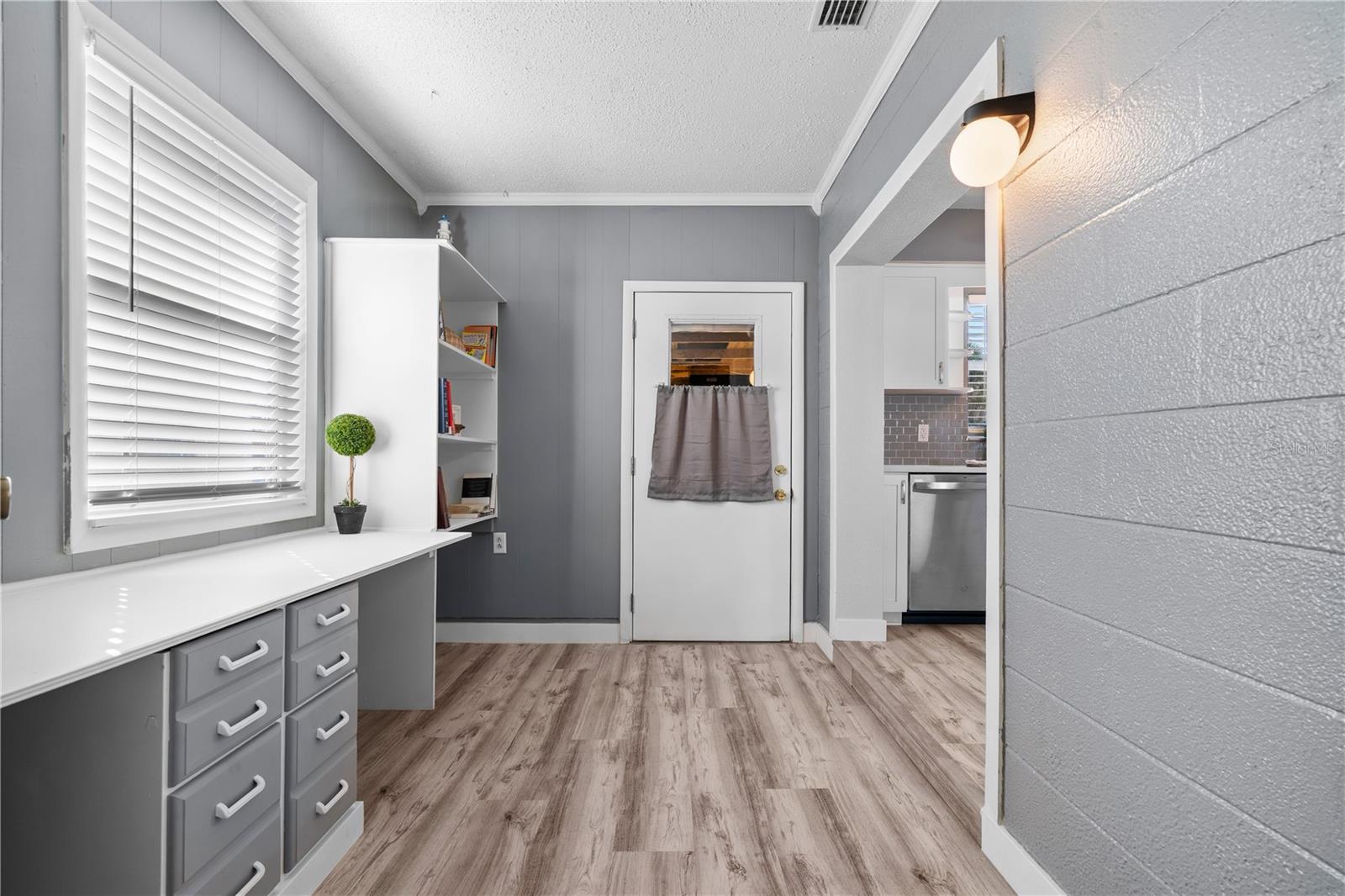 Office area leading out to garage