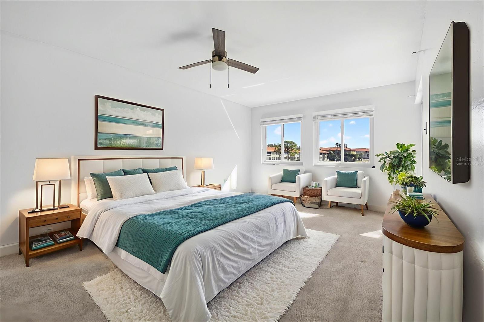 Virtually Staged. Your private retreat with water views, updated vanity, and serene coastal vibes. Wake up to sailboats gliding by.
