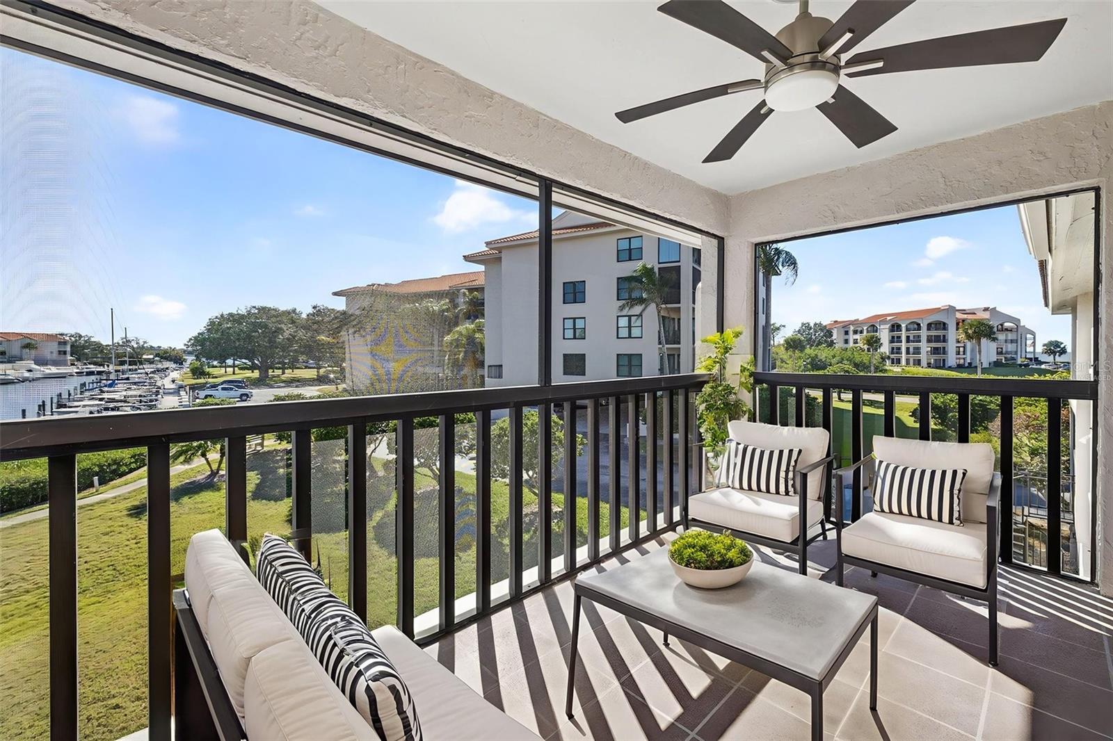 Virtually Staged. our front-row seat to marina life. Sailboats, palms, and endless blue skies from your private perch.