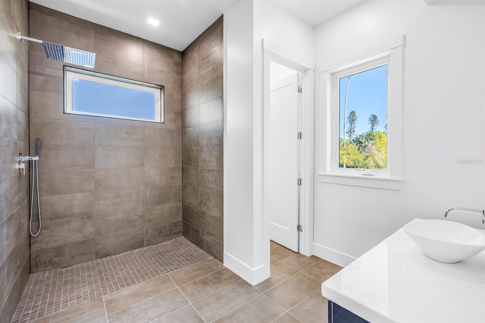Bathroom Four with Zero Entry Rain Shower, Custom Granity Top, Water Closet and Custom Walk-in Closet