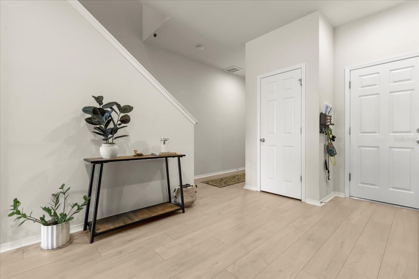 Entryway, closet, garage access