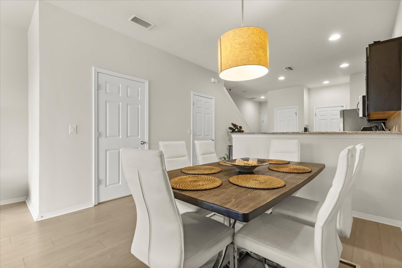 Formal dining, half bath & additional storage closet