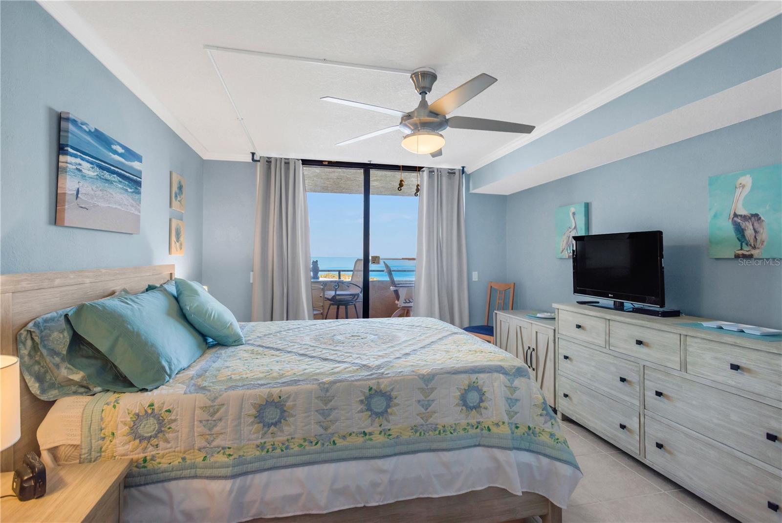 Exquisite Master Suite also has its own set of floor to ceiling sliders providing access to the open air patio.