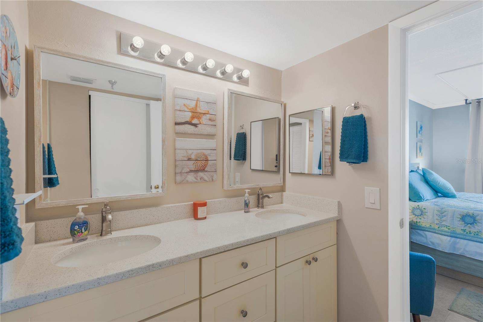 Large double sink vanity offers plenty of storage space.