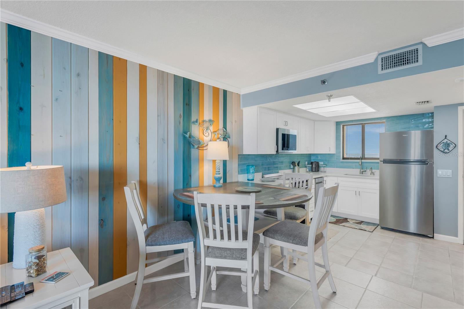 Another view of dining area as you look to the kitchen.
