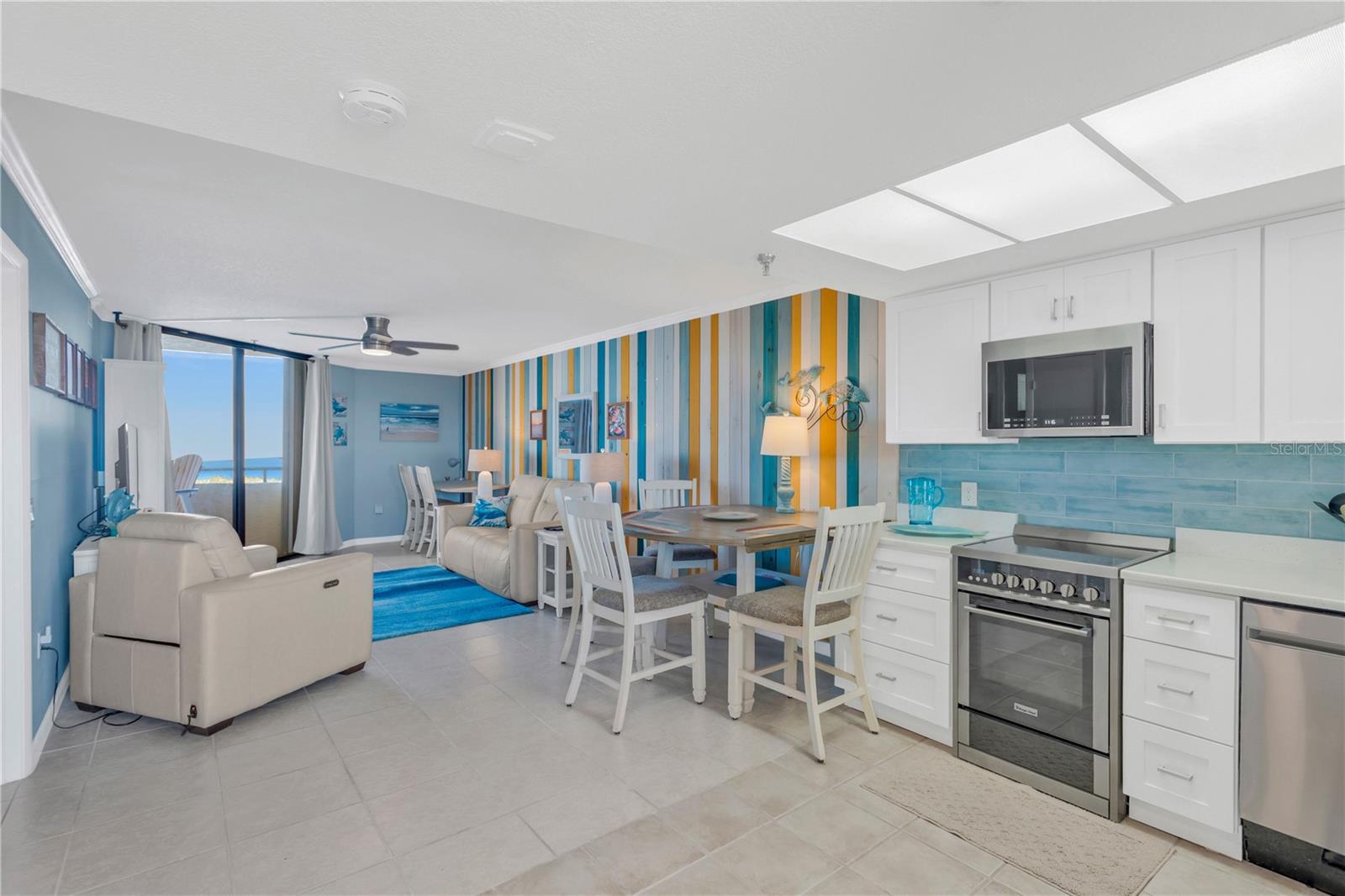 Open and bright floorplan.  Beautiful floor to ceiling sliders lead out to your private open air, covered balcony and amazing water views.