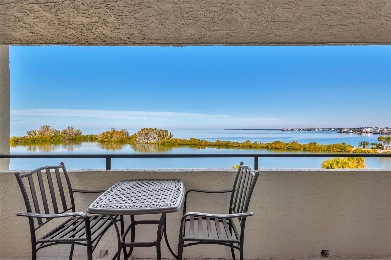 Sparkling Lagoon & Gulf of America water views are what makes living here so special.  Enjoy breakfast, lunch or dinner on your private patio with such amazing scenery.