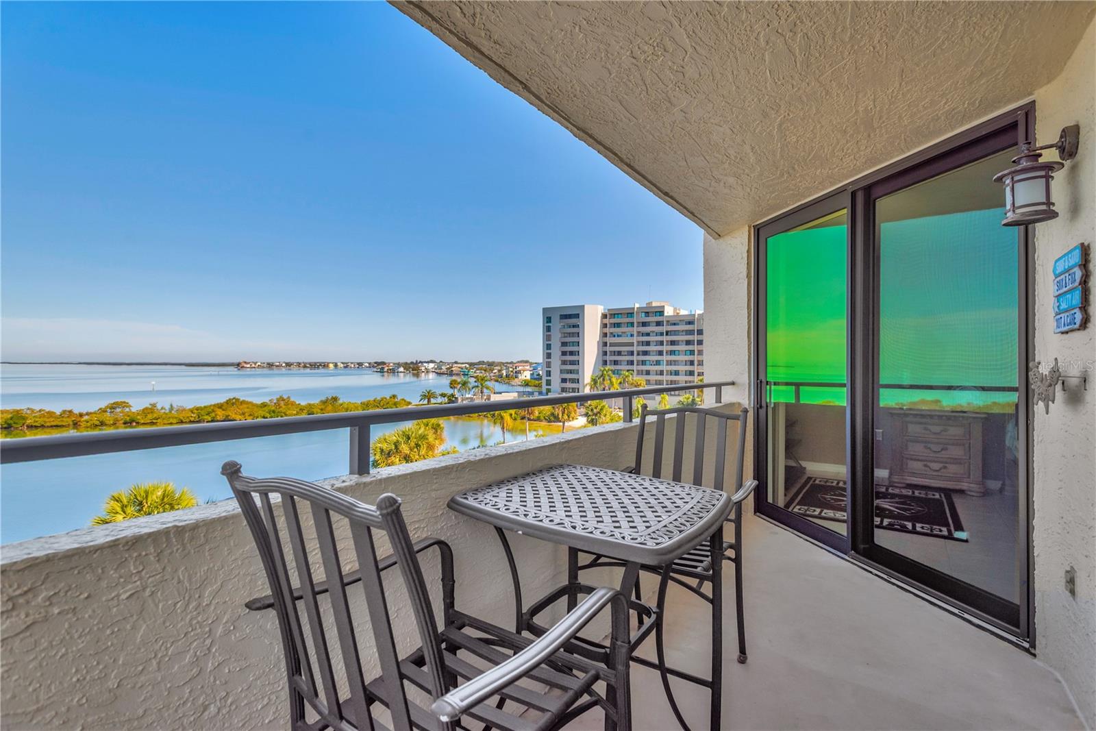 Alternate view from patio as you look out to Building 1 and Sam's Beach Bar.