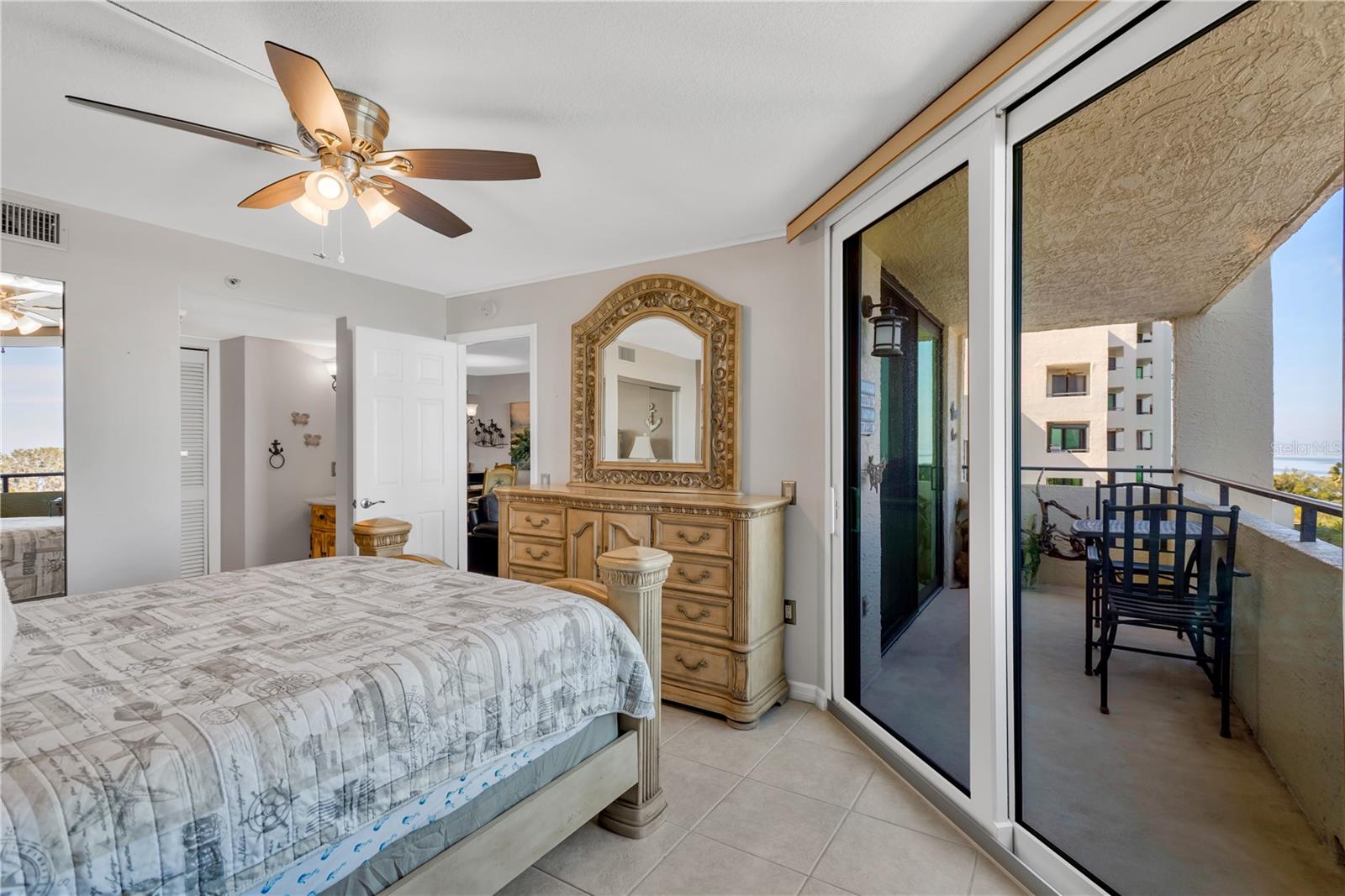 Regal Master Suite with private entrance to outdoor patio.