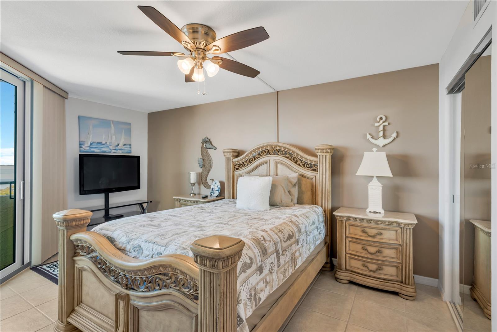 Master Bedroom with full closet on right behind mirror sliding doors.