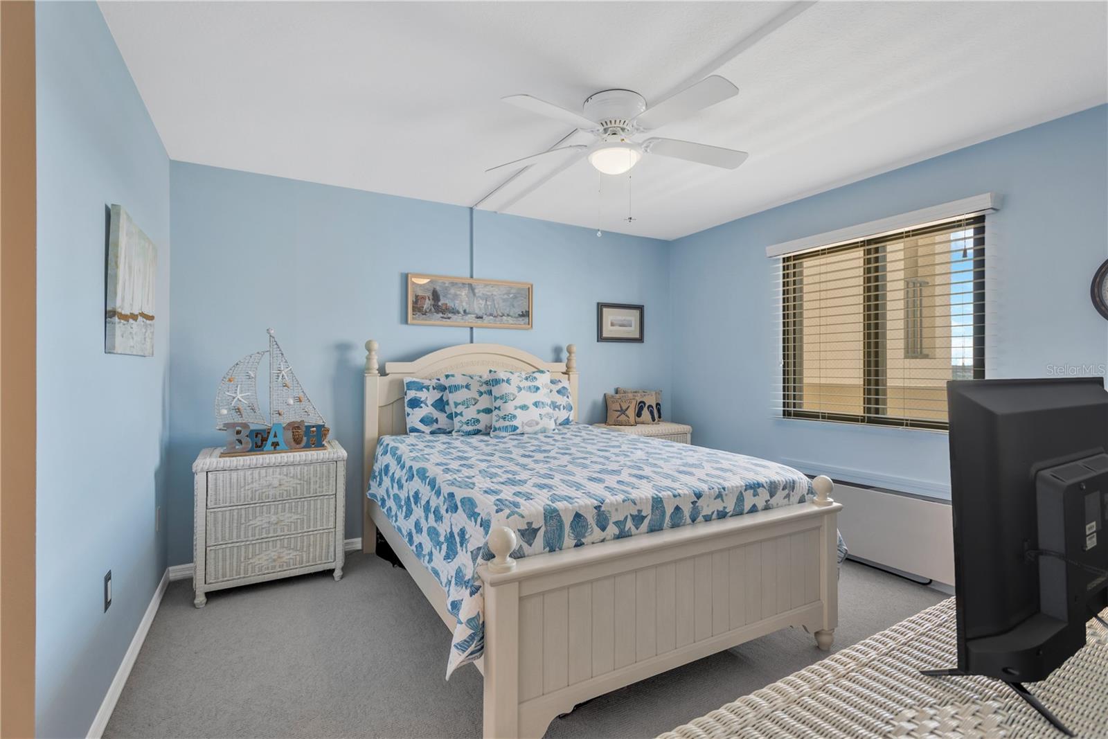 Love the coastal vibe of this inviting En-suite Guest Bedroom.