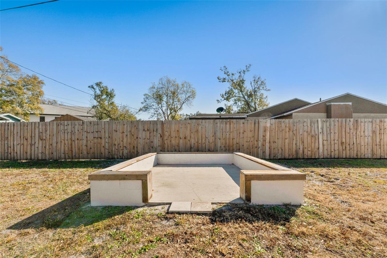 Concrete area for fire pit or grill station