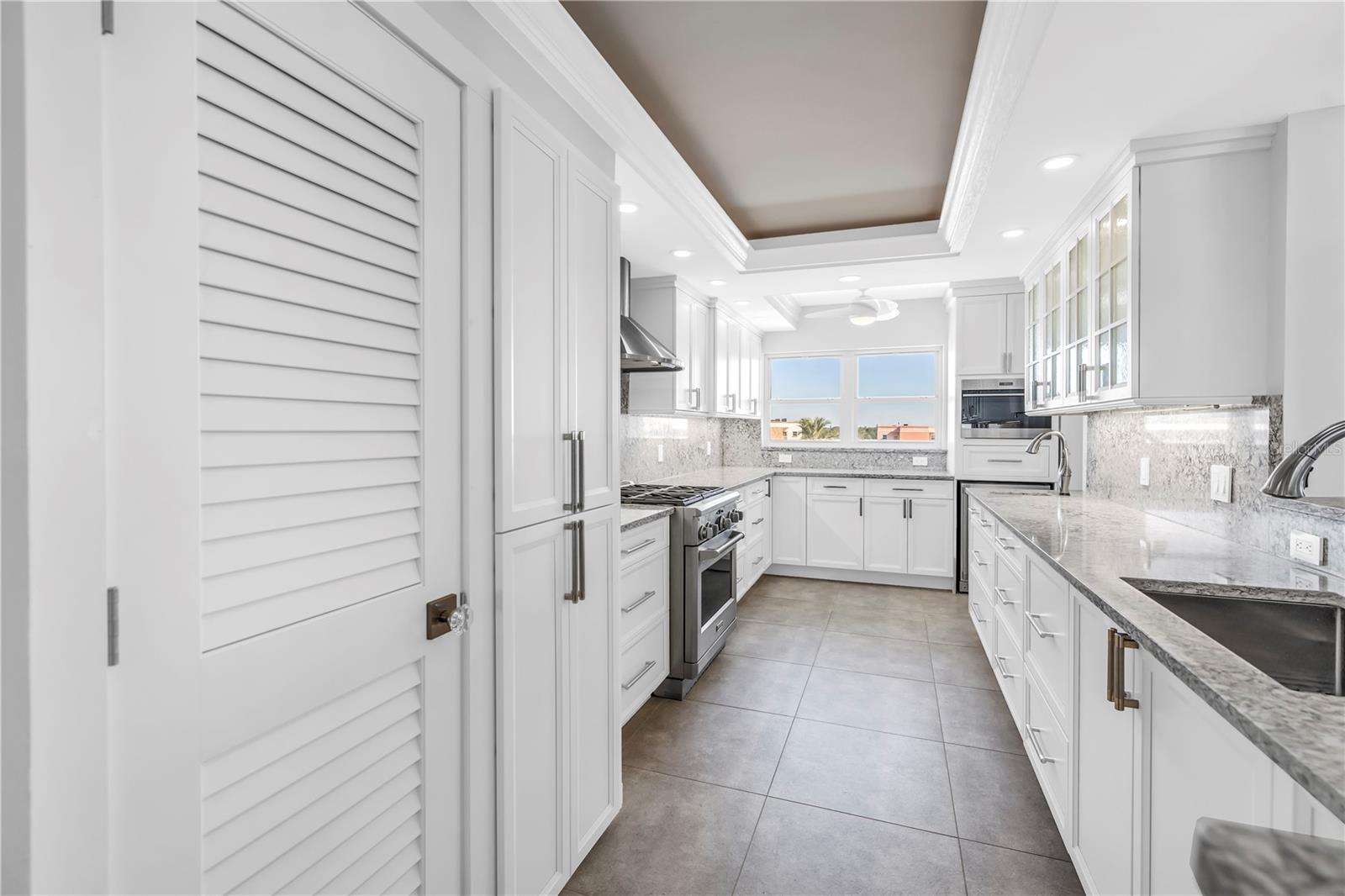 Custom cabinetry for spices ect to left of gas range