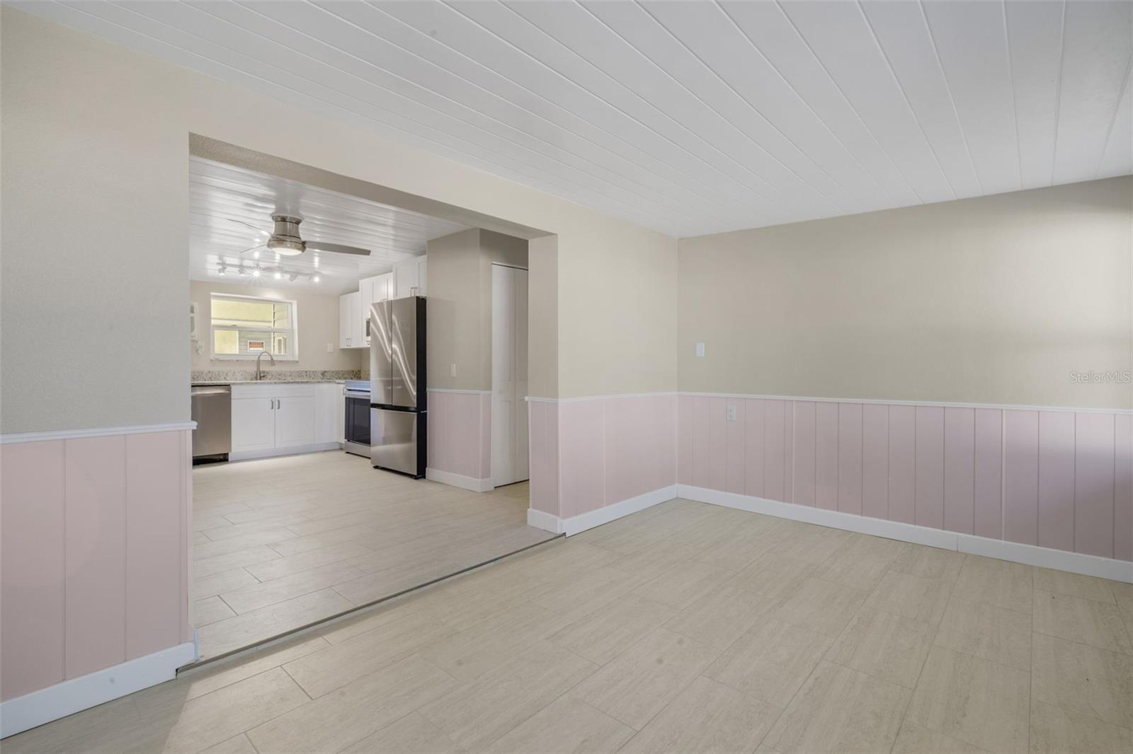 LIVING ROOM LOOKING INTO KITCHEN